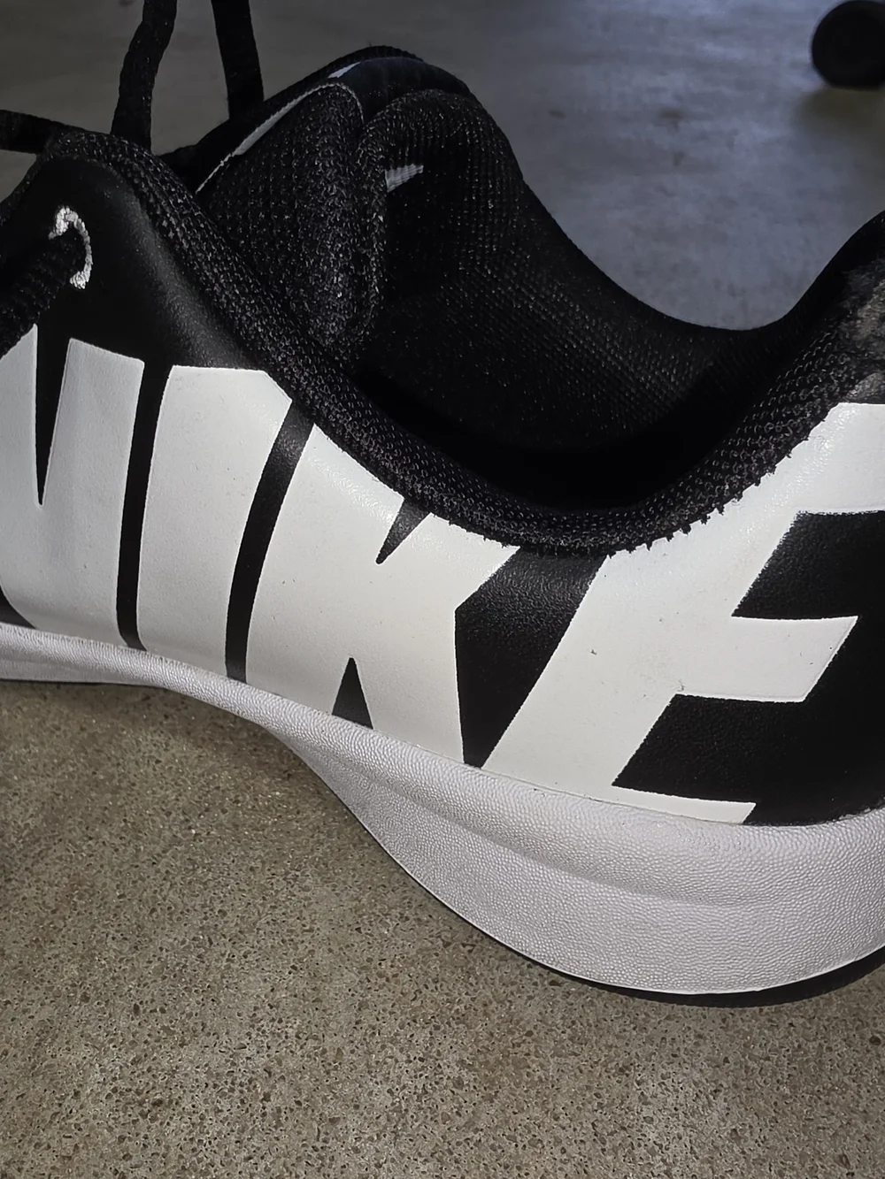 Nike Team Hustle D7 Black & White Youth Sneakers
